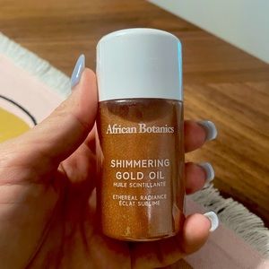 African botanics shimmering gold body oil